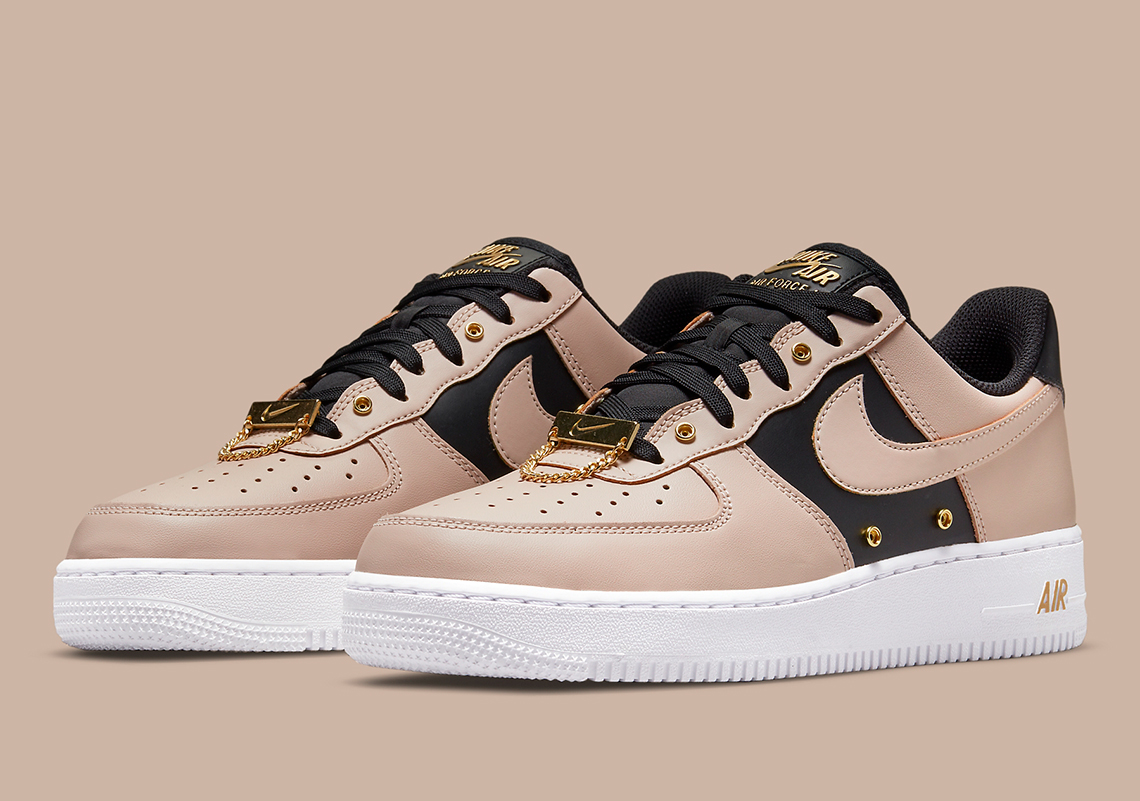 Nike bổ sung dây đeo bằng vàng kim loại và lớp da mới cho Air Force 1