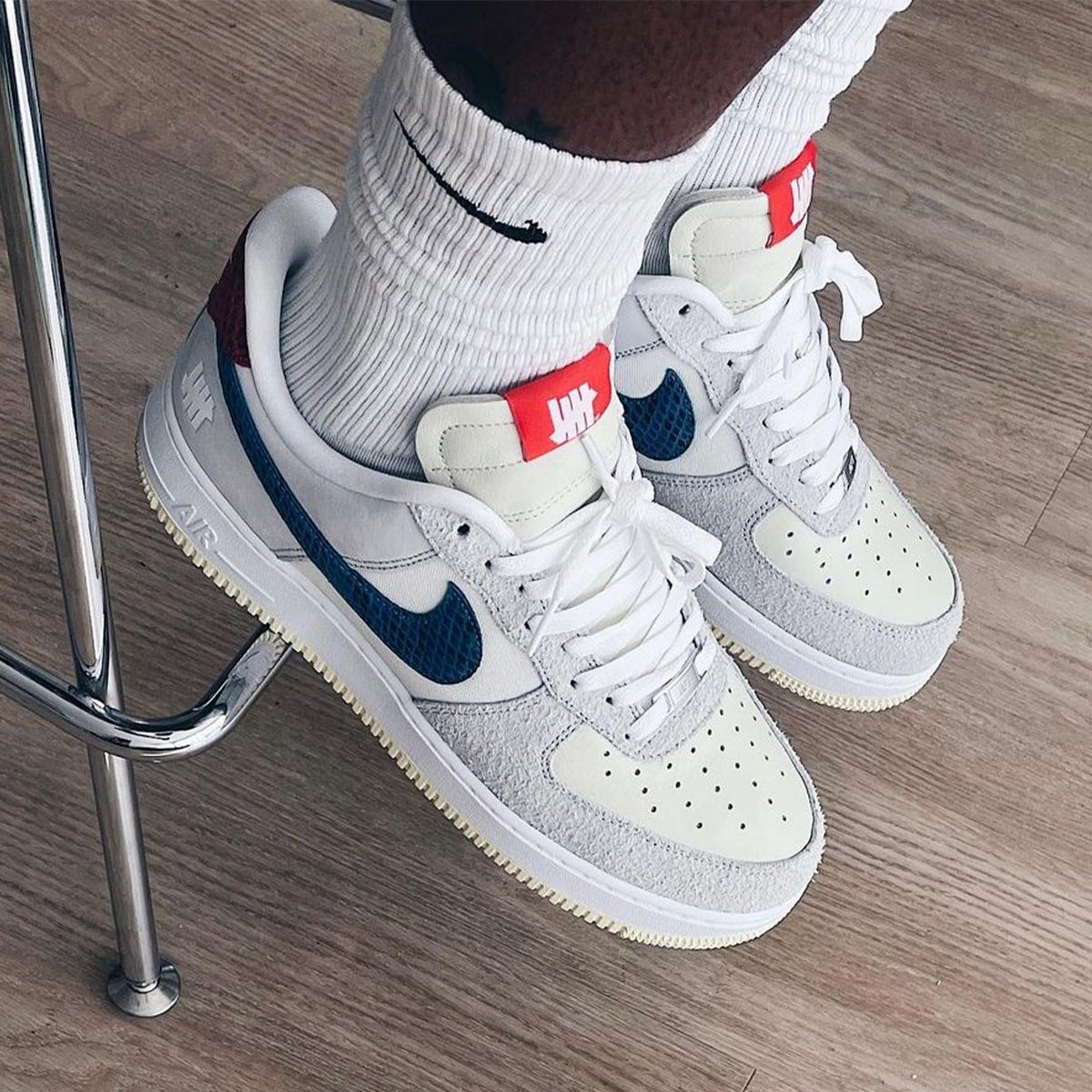 Another Air Force 1 x UNDEFEATED version appears in Suede and Snakeskin look