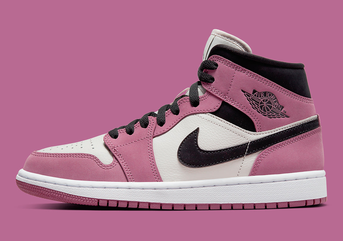 Jordan swaps out the red for Berry Pink on the new Air Jordan 1 Mid.