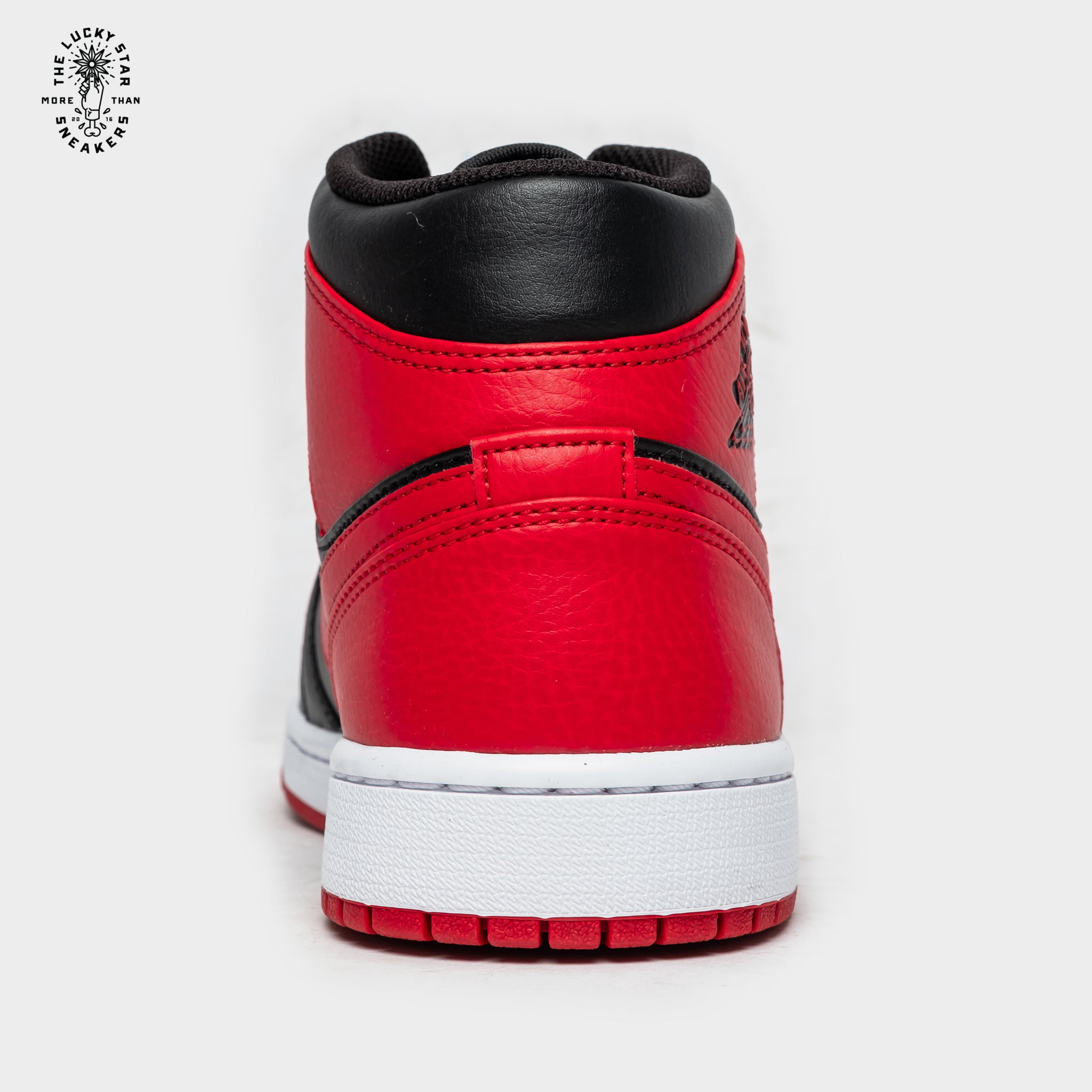 Jordan 1 Mid Banned
